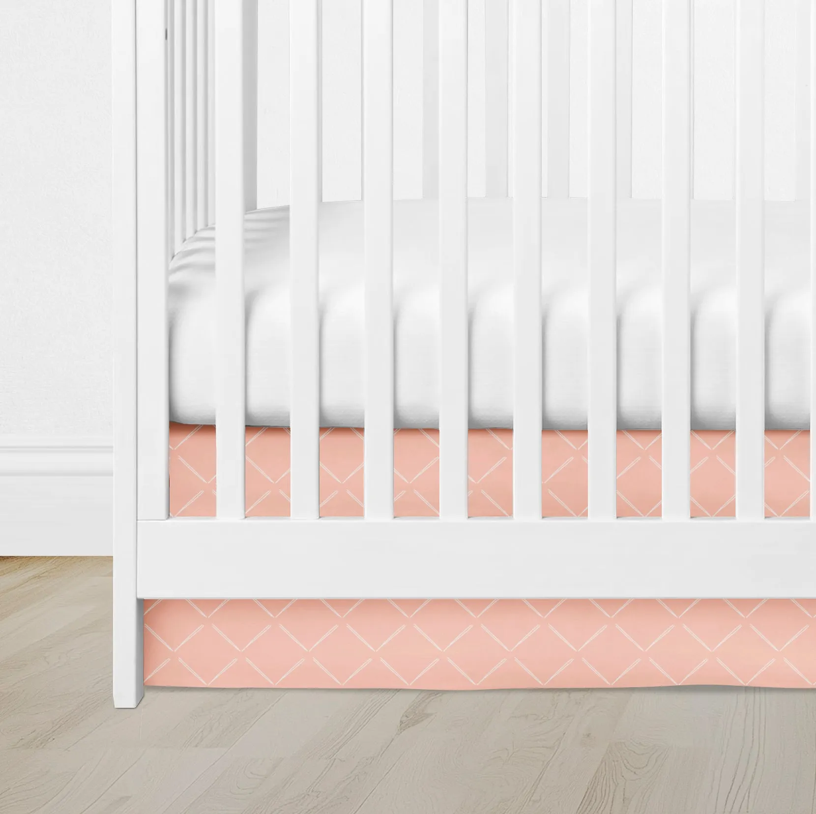 CRIB SKIRT - FAULTY ARROW IN DUSTY PEACH